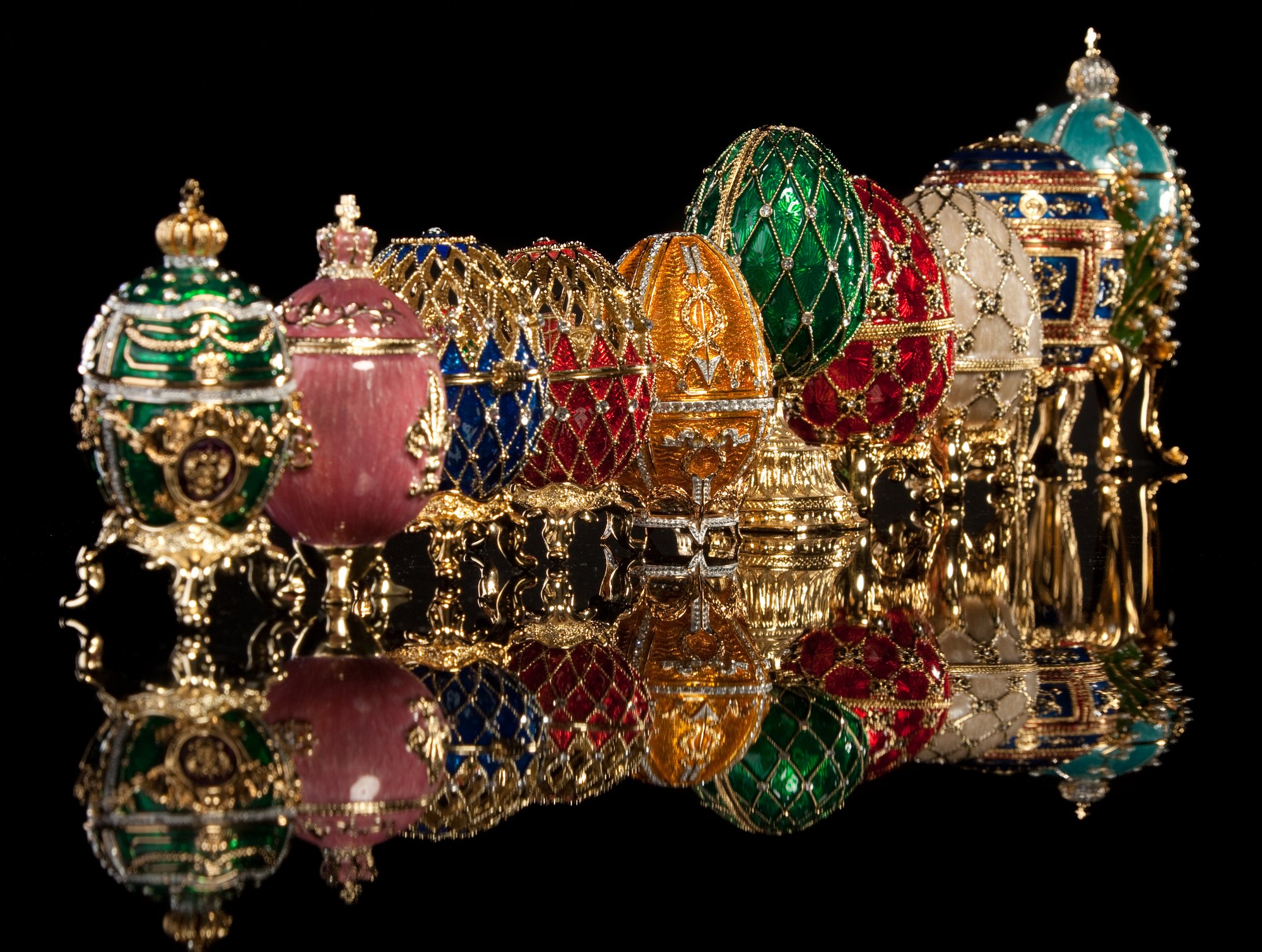Group Faberge eggs. Isolated on black.